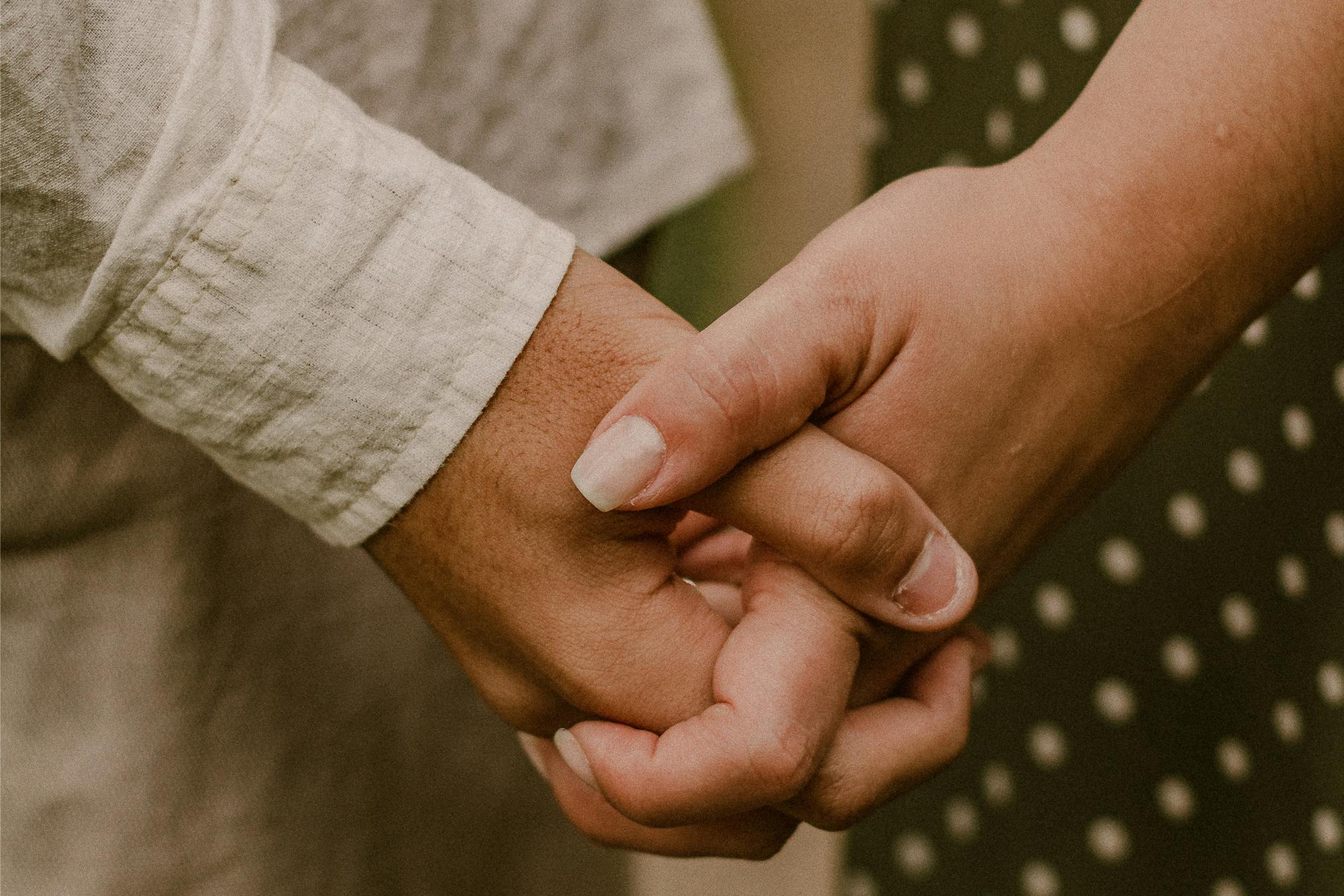 Picture of couple holding hands